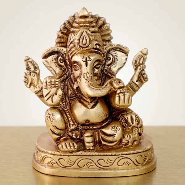 Brass_Seated_Ganesha_Idol_With_Decorative_Base