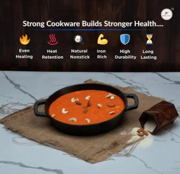 Cast_Iron_Fry_Pan_With_Wooden_Spatula