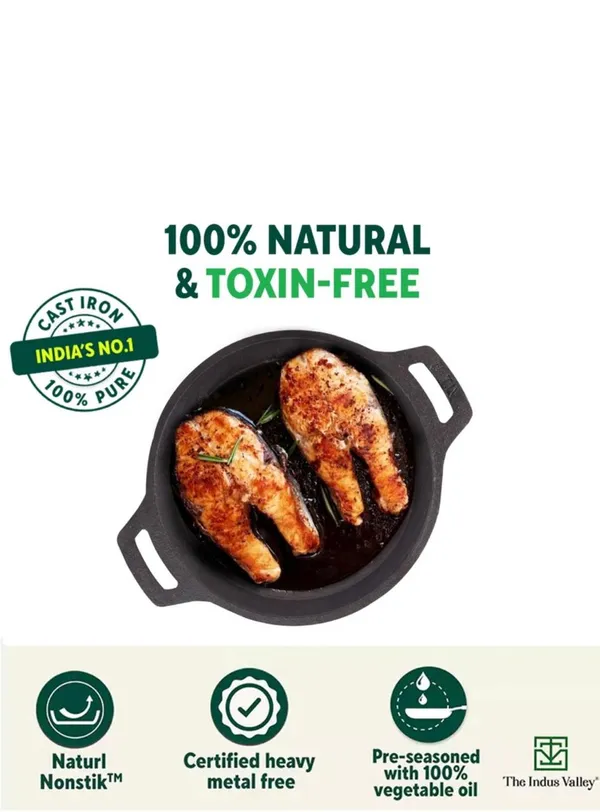 Cast_Iron_Fry_Pan_With_Wooden_Spatula