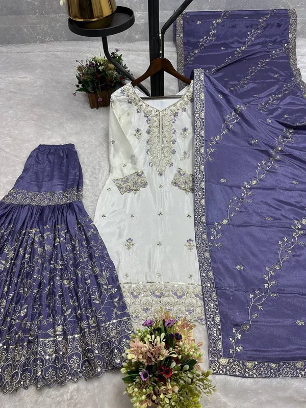 Woman_Wearing_Cream_and_Lavender_Embroidered_Sharara_