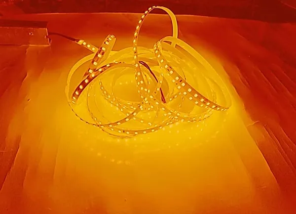 2835_LED_Flexible_10_mm_/_8_mm_Strip_Cove_Light_with_Self_Adhesive_Surface_IP-20_(5_Meter_(120_LED_per_Meter))_Decorative_with_12v_DC/SMPS_Adaptor_(Amber)