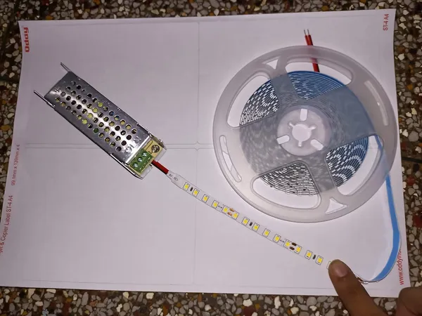2835_LED_Flexible_10_mm_/_8_mm_Strip_Cove_Light_with_Self_Adhesive_Surface_IP-20_(5_Meter_(120_LED_per_Meter))_Decorative_with_12v_DC/SMPS_Adaptor_(Amber)