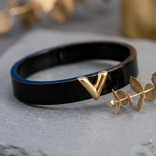 Golden_Stainless_Steel_Black_Enamel_V-Design_Bracelet_For_Women