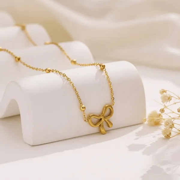 Golden_Anti-Tarnish_Plated_Bow_Pendant_Necklace_For_Women