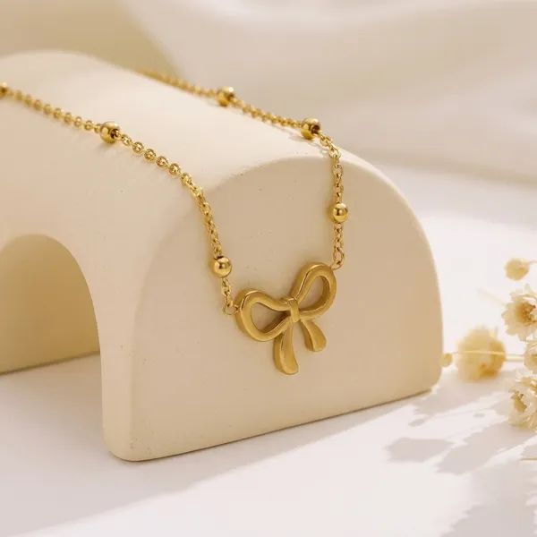 Golden_Anti-Tarnish_Plated_Bow_Pendant_Necklace_For_Women