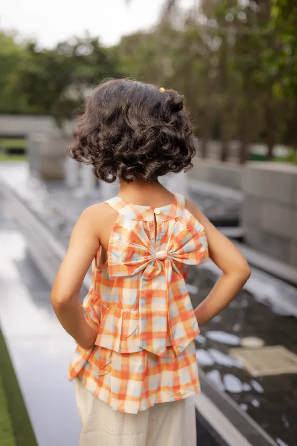 Orange_Premium_Cotton_Checkered_Sleeveless_Peplum_Top_Set_For_Girls