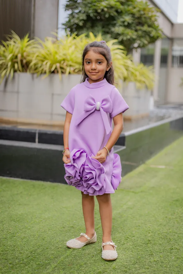 Lavender_Neoprene_Flared_Bow_Ruffle_Dress_For_Girls
