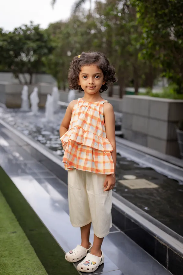 Orange_Premium_Cotton_Checkered_Sleeveless_Peplum_Top_Set_For_Girls