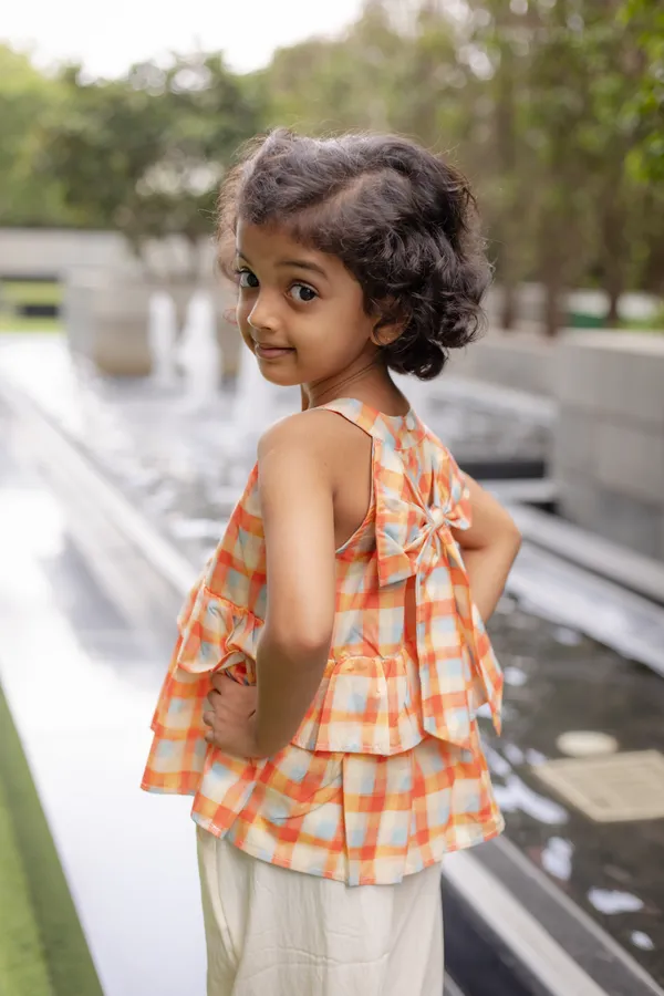 Orange_Premium_Cotton_Checkered_Sleeveless_Peplum_Top_Set_For_Girls