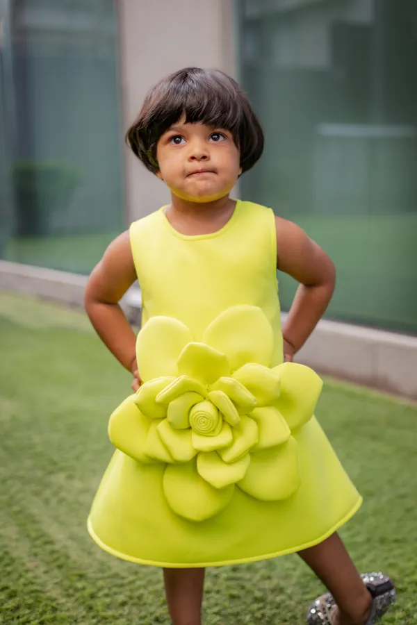 Yellow_Neoprene_Flared_Sleeveless_Frock_For_Girls