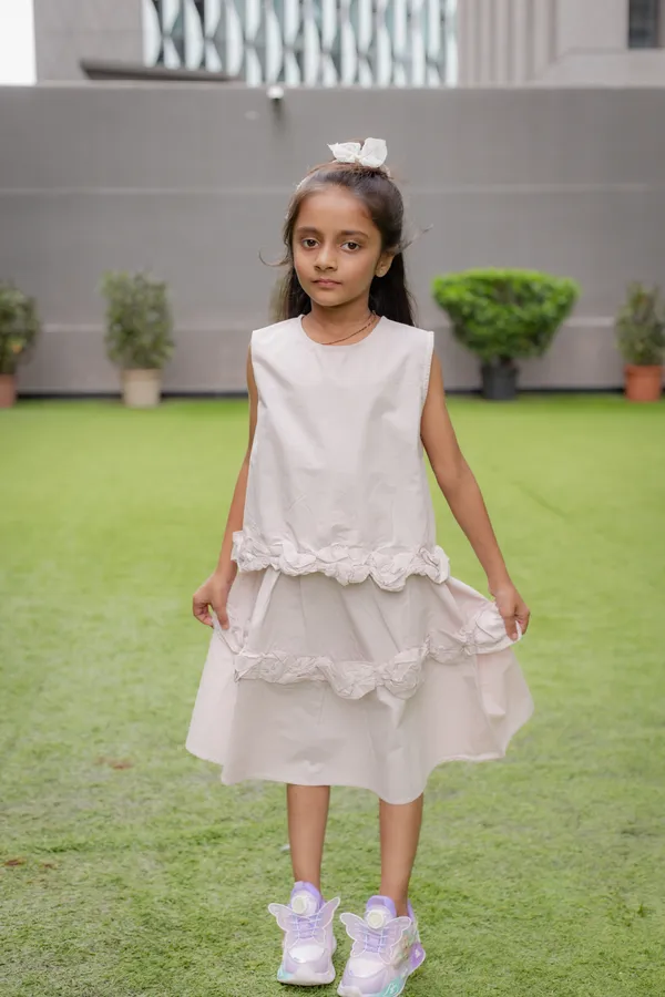 Ivory_Premium_Cotton_Sleeveless_Ruffle_Layered_Dress_For_Girls