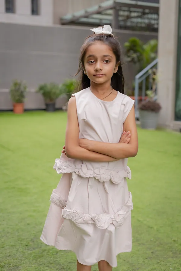 Ivory_Premium_Cotton_Sleeveless_Ruffle_Layered_Dress_For_Girls