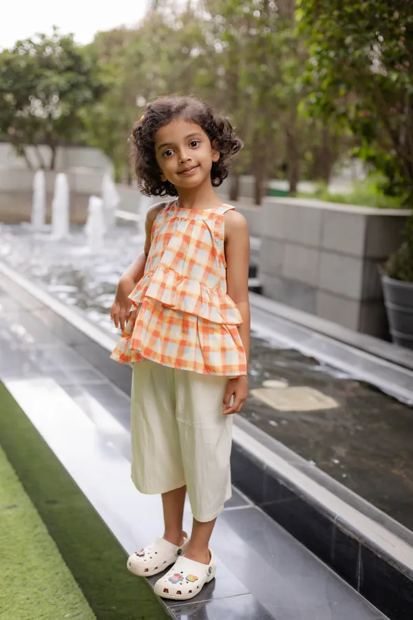 Orange_Premium_Cotton_Checkered_Sleeveless_Peplum_Top_Set_For_Girls