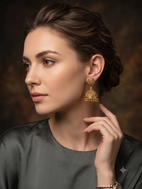 Elegant_Gold_Finish_Crystal_Studded_Jhumka_Earrings