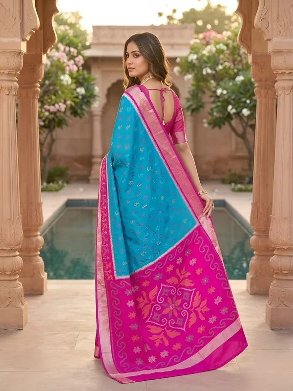 Turquoise_blue_and_magenta_Pochampally_silk_saree