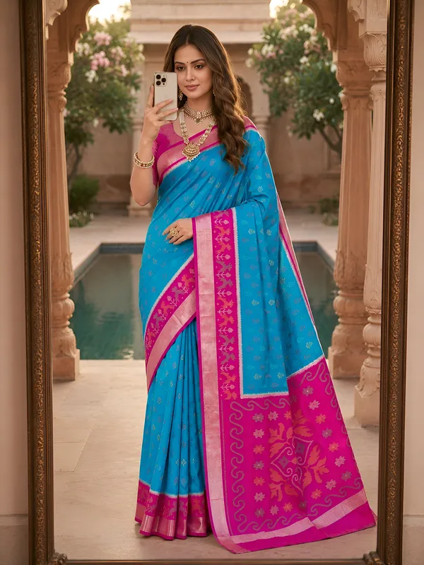 Turquoise_blue_and_magenta_Pochampally_silk_saree