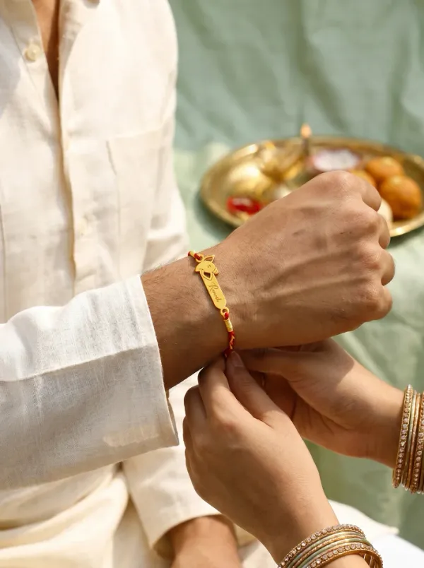 Golden_Personalised_Sacred_Ganesha_Rakhi