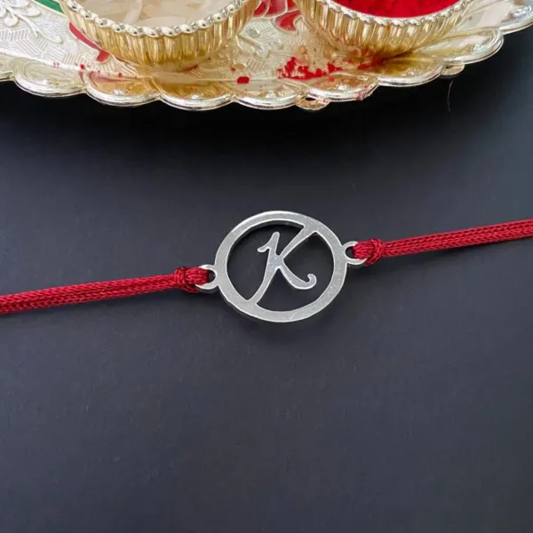 Round_Initial_Rakhi
