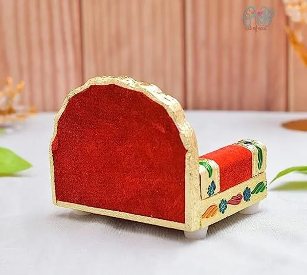 Beautifully_handcrafted_wooden_Meenakari_Singhasan_designed_specifically_for_Laddu_Gopal_deity.Made_from_high-quality_wood_with_intricate_Meenakari_artwork_in_golden_color,_adding_elegance_to_your_Pooja_Mandir.