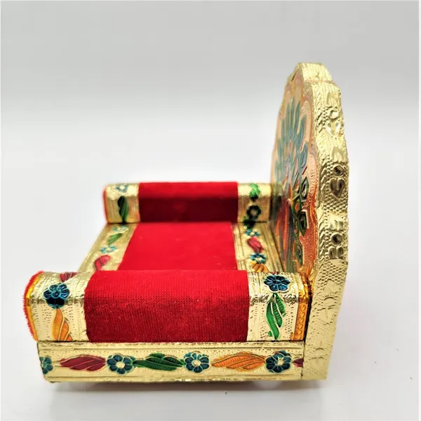 Beautifully_handcrafted_wooden_Meenakari_Singhasan_designed_specifically_for_Laddu_Gopal_deity.Made_from_high-quality_wood_with_intricate_Meenakari_artwork_in_golden_color,_adding_elegance_to_your_Pooja_Mandir.