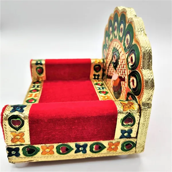 Beautifully_handcrafted_wooden_Meenakari_Singhasan_designed_specifically_for_Laddu_Gopal_deity.Made_from_high-quality_wood_with_intricate_Meenakari_artwork_in_golden_color,_adding_elegance_to_your_Pooja_Mandir.