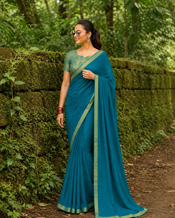 Teal_Printed_Saree_With_Gold_Border_for_Women