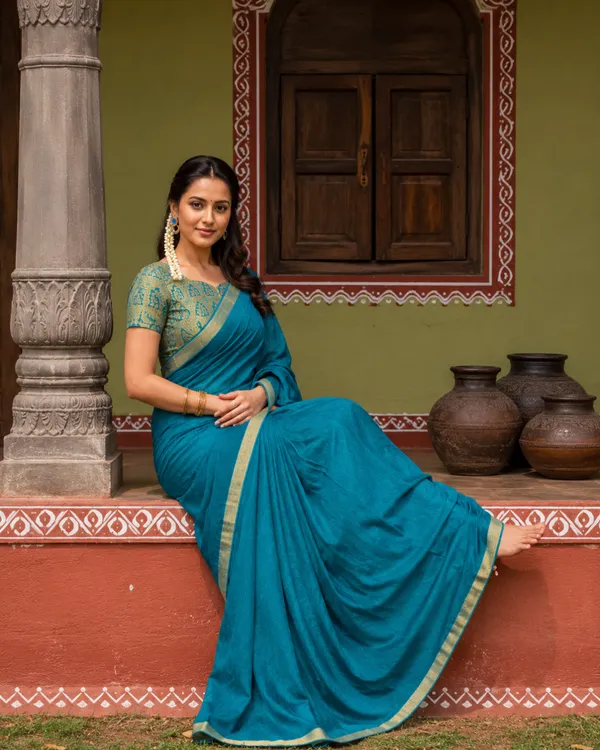 Teal_Printed_Saree_With_Gold_Border_for_Women