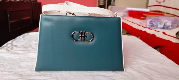 Teal_Blue_Structured_Handbag_With_Metal_Clasp_For_Women