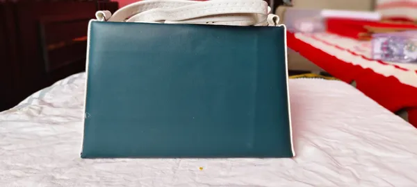 Teal_Blue_Structured_Handbag_With_Metal_Clasp_For_Women