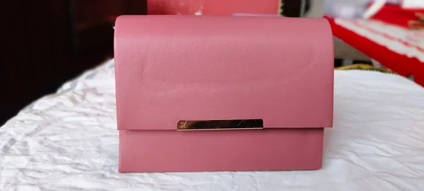 Pink_Structured_Flap_Clutch_with_Gold_Accent_for_Women