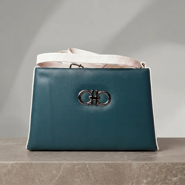 Teal_Blue_Structured_Handbag_With_Metal_Clasp_For_Women