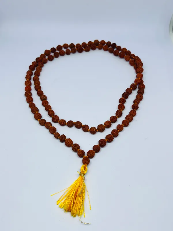 Rudraksha_Mala_with_Yellow_Tassel_for_Prayer_and_Meditation