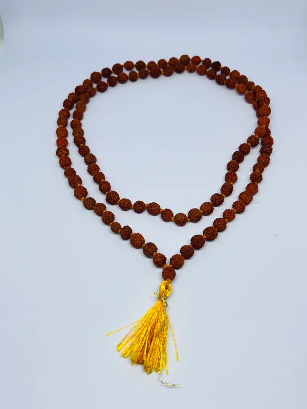 Rudraksha_Mala_with_Yellow_Tassel_for_Prayer_and_Meditation