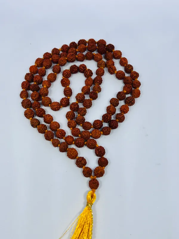 Rudraksha_Mala_with_Yellow_Tassel_for_Prayer_and_Meditation