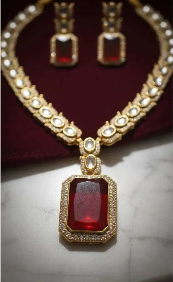 Gold_And_Maroon_Brass_Ruby_Polki_Kundan_Jewellery_Set_For_Women