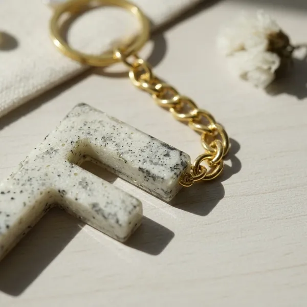 White_Resin_Letter_F_Keychain_With_Gold_Ring