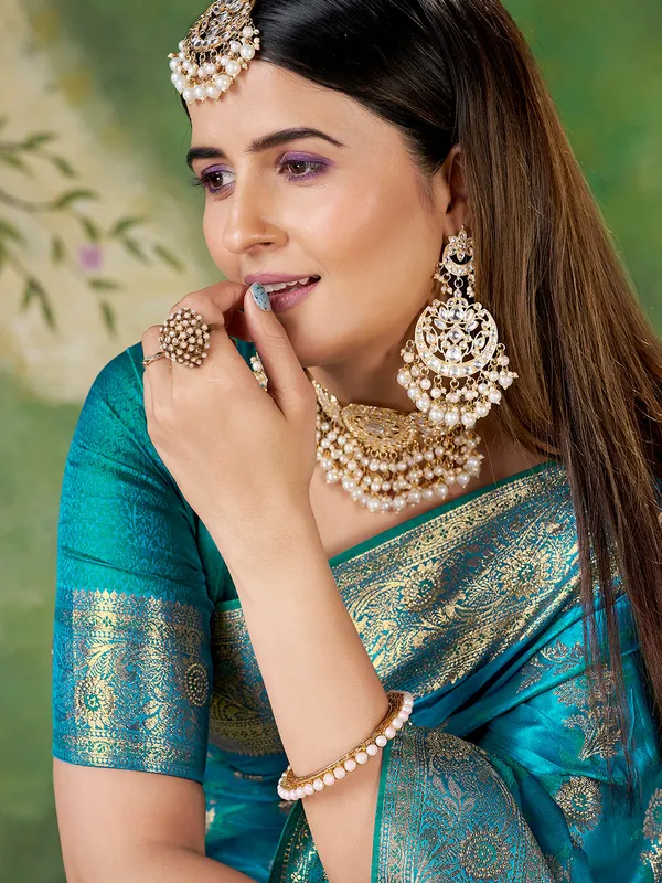 Teal_Blue_Banarasi_Jacquard_Zari_Woven_Saree_With_Unstitched_Blouse_Default_Title