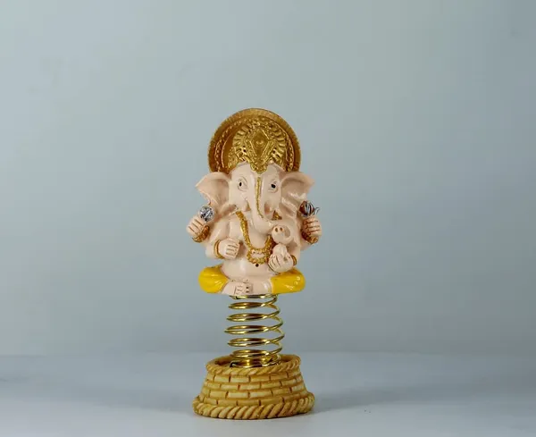 Yellow_Porcelain_Ganesha_Idol_For_Home_Decor