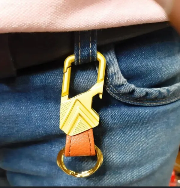 Festilo_Luxury_Gold_Metal_Carabiner_Keychain_with_Integrated_Bottle_Opener_|_Heavy-Duty_EDC_Key_Organizer_with_Textured_Tan_Leather_Strap_&_Dual_Split_Rings_for_Car,_Bike,_Home_&_Office_Keys_|_Premium_Gift_for_Men_&_Women