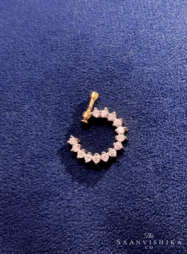 Golden_Alloy_Single_Cz_Diamond_Bordered_Nose_Pin_For_Women