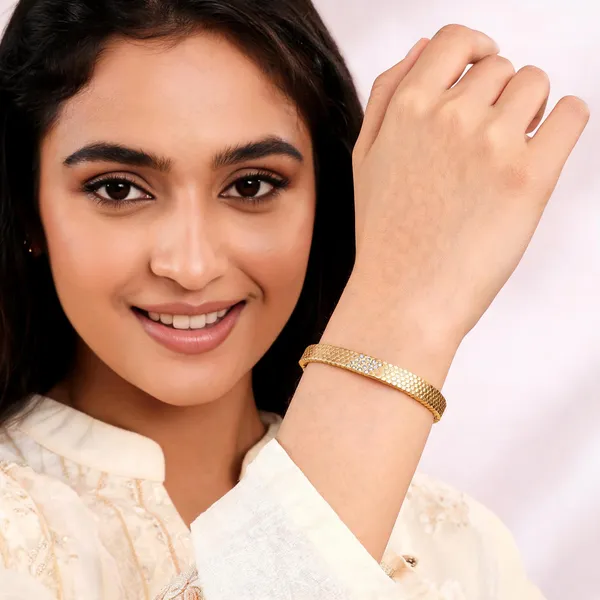 Gold_Textured_Bangle_With_Crystal_Embellishments_For_Women