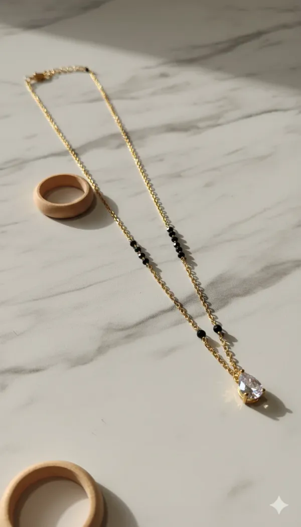 Elegant_Gold_Plated_Black_Bead_Mangalsutra_With_Teardrop_Pendant