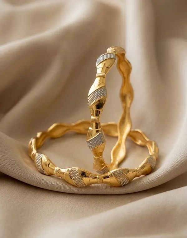 Gold_Twisted_Textured_Bangles_For_Women_(Set_Of_2)
