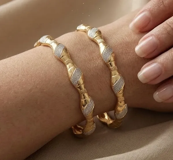 Gold_Twisted_Textured_Bangles_For_Women_(Set_Of_2)