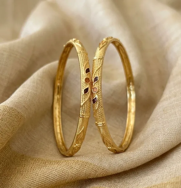 Gold_Textured_With_Stone_Embellishments_Bangles_For_Women_(Set_Of_2)
