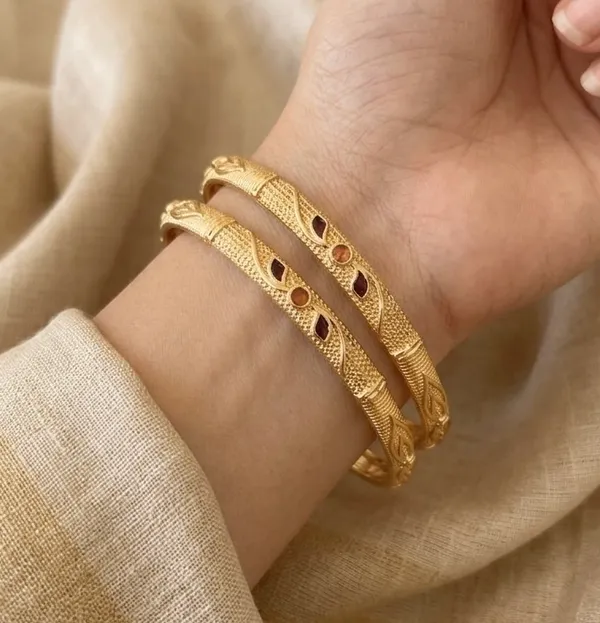 Gold_Textured_With_Stone_Embellishments_Bangles_For_Women_(Set_Of_2)