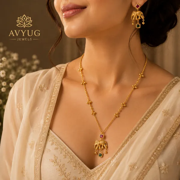 Gold_with_elephant_cut_hoops__long_set_with_earings