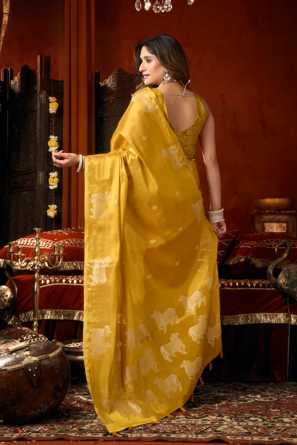 Yellow_Heavy_Tissue_Cow_Butta_Tassel_Saree_For_Women