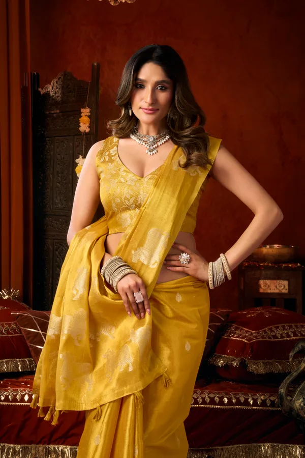 Yellow_Heavy_Tissue_Cow_Butta_Tassel_Saree_For_Women