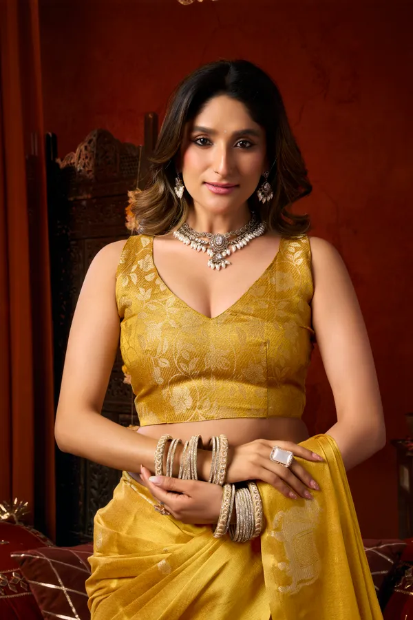 Yellow_Heavy_Tissue_Cow_Butta_Tassel_Saree_For_Women